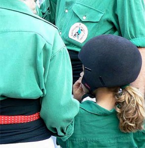 The enxaneta, the acotxador and the dosos wear helmet for their safety. This is seny. PHOTO: Castellers de Sant Cugat