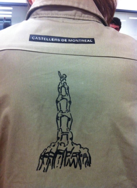 Castellers de Montréal have gained their reputation for being one of the oldest colles overseas. They are also one of the few on having any image on the back of the shirts: their badge.